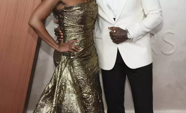 Ryan Michelle Bathe, left, and Sterling K. Brown arrive at the Oscars on Sunday, March 2, 2025, at the Dolby Theatre in Los Angeles. (Photo by Jordan Strauss/Invision/AP)