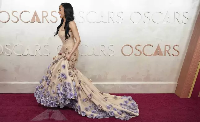 Kristy Sarah arrives at the Oscars on Sunday, March 2, 2025, at the Dolby Theatre in Los Angeles. (AP Photo/Jae C. Hong)