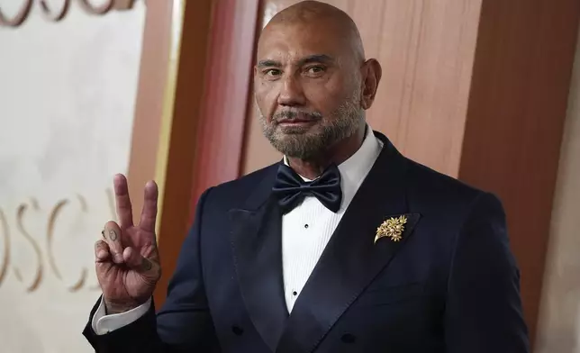 Dave Bautista arrives at the Oscars on Sunday, March 2, 2025, at the Dolby Theatre in Los Angeles. (Photo by Jordan Strauss/Invision/AP)