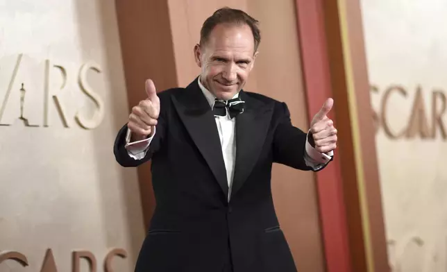 Ralph Fiennes arrives at the Oscars on Sunday, March 2, 2025, at the Dolby Theatre in Los Angeles. (Photo by Richard Shotwell/Invision/AP)
