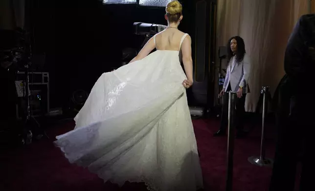 Elle Fanning arrives at the Oscars on Sunday, March 2, 2025, at the Dolby Theatre in Los Angeles. (AP Photo/John Locher)