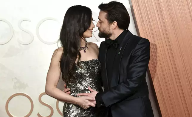 Jazz Charton, left, and Kieran Culkin arrive at the Oscars on Sunday, March 2, 2025, at the Dolby Theatre in Los Angeles. (Photo by Richard Shotwell/Invision/AP)