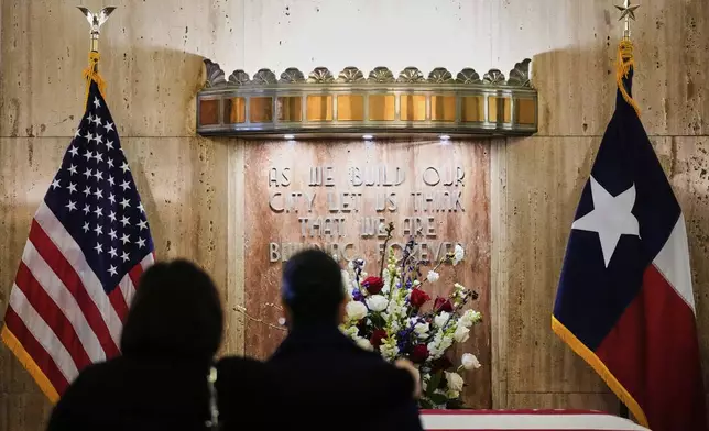People pay their respects as the remains of U.S. Rep. Sylvester Turner of Texas lie in state at Houston City Hall on Tuesday, March 11, 2025, in Houston. (AP Photo/Ashley Landis)