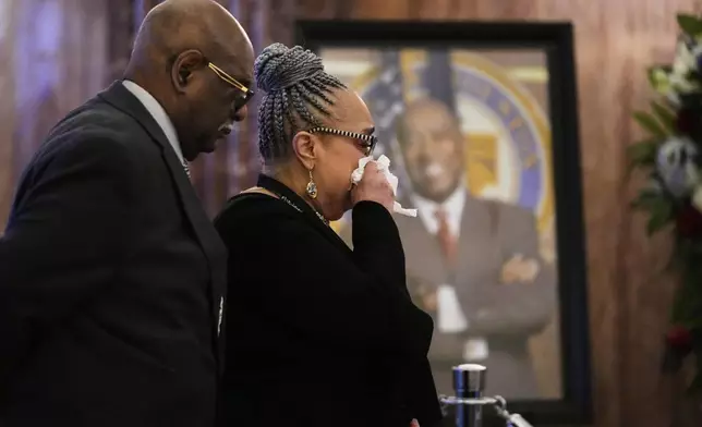 People pay their respects as the remains of U.S. Rep. Sylvester Turner of Texas lie in state at Houston City Hall on Tuesday, March 11, 2025, in Houston. (AP Photo/Ashley Landis)