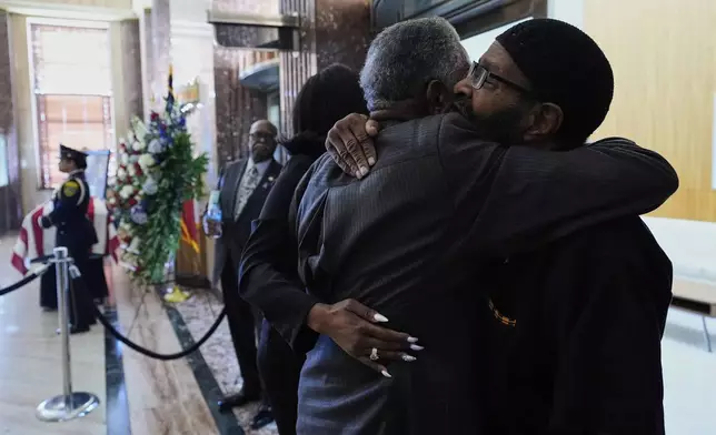 People pay their respects as the remains of U.S. Rep. Sylvester Turner of Texas lie in state at Houston City Hall on Tuesday, March 11, 2025, in Houston. (AP Photo/Ashley Landis)