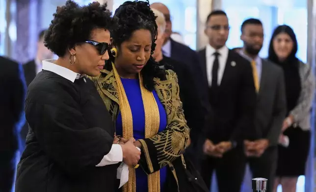 People offer their respects as the remains of U.S. Rep. Sylvester Turner of Texas lie in state at Houston City Hall on Tuesday, March 11, 2025, in Houston. (AP Photo/Ashley Landis)