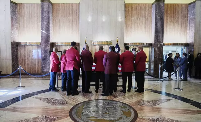 People pay their respects as the remains of U.S. Rep. Sylvester Turner of Texas lie in state at Houston City Hall on Tuesday, March 11, 2025, in Houston. (AP Photo/Ashley Landis)