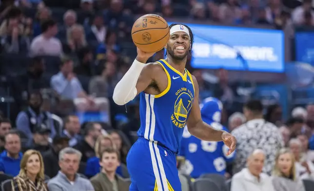 Golden State Warriors forward Jimmy Butler III looks on during the first half of an NBA basketball game against the Portland Trail Blazers in San Francisco, Monday, March 10, 2025. (AP Photo/Nic Coury)