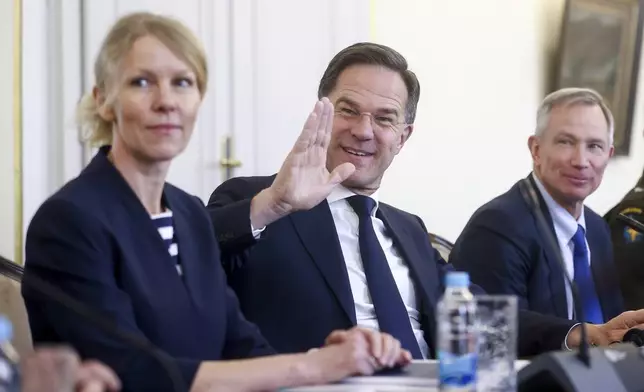 NATO Secretary General Mark Rutte waves to the members of the media prior to the start of his meeting with the members of the Bosnian Presidency in Sarajevo, Bosnia, Monday, March 10, 2025. (AP Photo/Armin Durgut)
