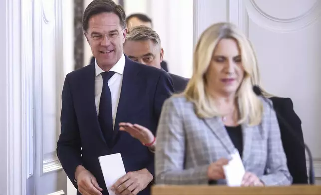 NATO Secretary General Mark Rutte walks out of a meeting with the members of the Bosnian Presidency prior to the start of their press conference in Sarajevo, Bosnia, Monday, March 10, 2025. (AP Photo/Armin Durgut)