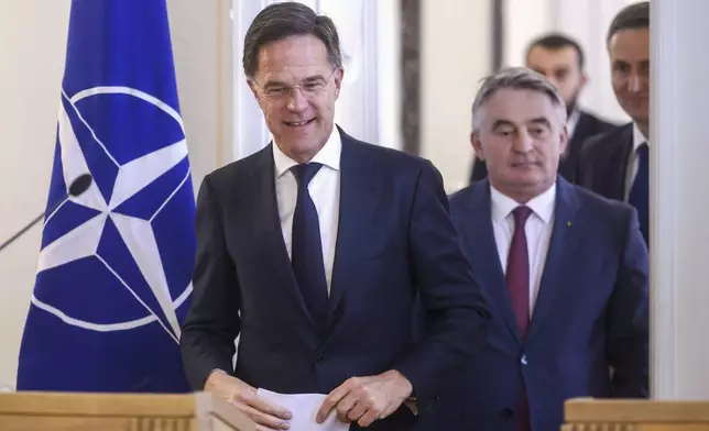NATO Secretary General Mark Rutte walks out of a meeting with the members of the Bosnian Presidency prior to the start of their press conference in Sarajevo, Bosnia, Monday, March 10, 2025. (AP Photo/Armin Durgut)