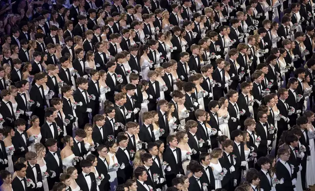Around 700 young people opened the Elmayer-Kränzchen this year, a Traditional Ball of the Elmayer Dance School in Vienna, Austria, Tuesday, March 4, 2025. (AP Photo/Denes Erdos)
