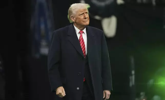 President Donald Trump attends the finals at the NCAA wrestling championship, Saturday, March 22, 2025, in Philadelphia. (AP Photo/Matt Rourke)