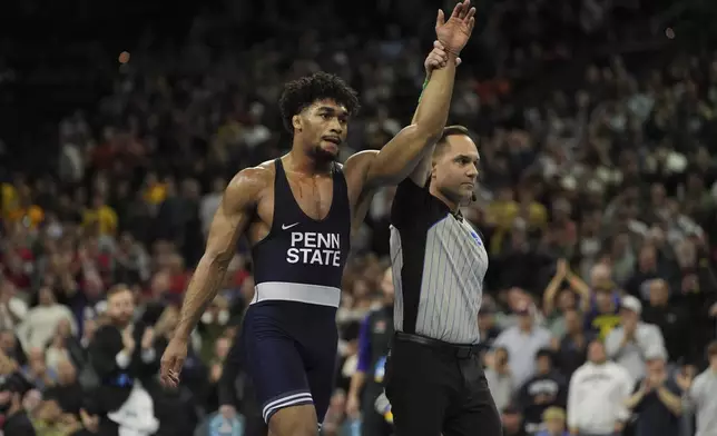 Penn State's Carter Starocci reacts after defeating Northern Iowa's Parker Keckeisen during a 184-pound match in the finals at the NCAA wrestling championship, Saturday, March 22, 2025, in Philadelphia. (AP Photo/Matt Rourke)
