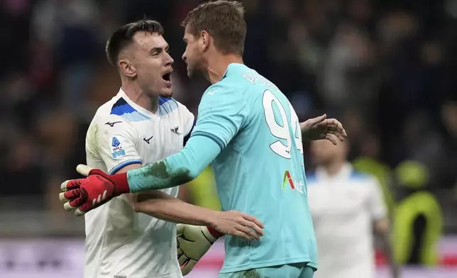 Lazio's Patric, left, and Lazio's goalkeeper Ivan Provedel celebrate after the Serie A soccer match between AC Milan and Lazio at the San Siro stadium, in Milan, Italy, Sunday, March 2, 2025. (AP Photo/Antonio Calanni)