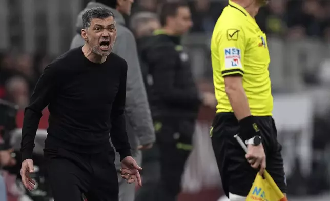 AC Milan's head coach Sergio Conceicao shouts during the Serie A soccer match between AC Milan and Lazio at the San Siro stadium, in Milan, Italy, Sunday, March 2, 2025. (AP Photo/Antonio Calanni)