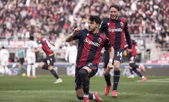 Bologna's Riccardo Orsolini celebrates after scoring during the Italian Serie A soccer match between Bologna and Cagliari at the Renato Dall'Ara Stadium, in Bologna, Italy, Sunday, March 2, 2025. (Michele Nucci/LaPresse via AP)