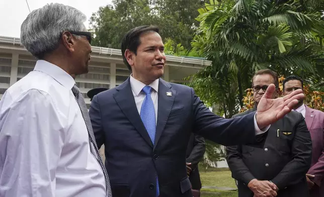 U.S. Secretary of State Marco Rubio gestures as he visits Georgetown, Guyana, Thursday, March 27, 2025. (Nathan Howard/Pool photo via AP)