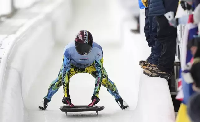 Yaroslav Lavreniuk, of Ukraine, finishes his fourth run at the skeleton world championships, Friday, March 7, 2025, in Lake Placid, N.Y. (AP Photo/Julia Demaree Nikhinson)