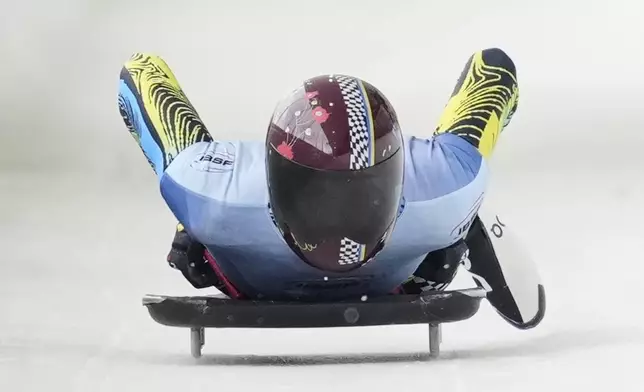 Yaroslav Lavreniuk, of Ukraine, finishes his fourth run at the skeleton world championships, Friday, March 7, 2025, in Lake Placid, N.Y. (AP Photo/Julia Demaree Nikhinson)