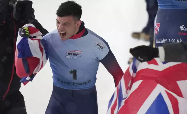 Matt Weston, of Britain, reacts after finishing his fourth run at the skeleton world championships, Friday, March 7, 2025, in Lake Placid, N.Y. (AP Photo/Julia Demaree Nikhinson)
