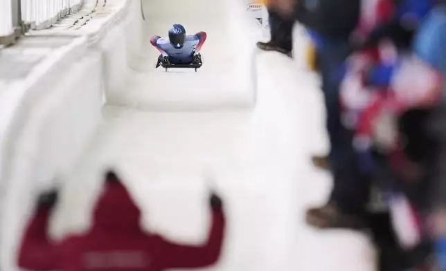 Matt Weston, of Britain, finishes his fourth run at the skeleton world championships, Friday, March 7, 2025, in Lake Placid, N.Y. (AP Photo/Julia Demaree Nikhinson)