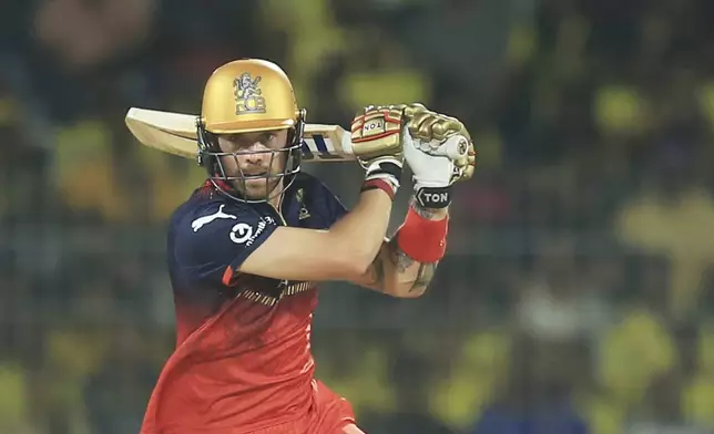 Royal Challengers Bengaluru's Phil Salt plays a shot during the Indian Premier League cricket match between Chennai Super Kings and Royal Challengers Bengaluru at M. A. Chidambaram Stadium in Chennai, India, Friday, March 28, 2025. (AP Photo/R. Parthibhan)