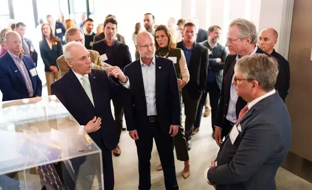 Leader Steve Scalise; Chairman Brendan Carr of the FCC; Barbee Ponder, Globalstar VP Legal &amp; Regulatory Affairs; Dr. Paul Jacobs, Globalstar CEO discuss Globalstar satellite replica during the Grand Opening ceremony of Satellite Operations Control Center.