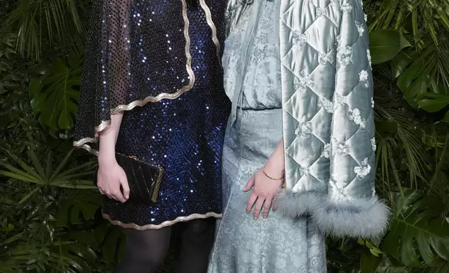 Elle Fanning, left, and Dakota Fanning arrive at Chanel's 16th Annual Pre-Oscar Awards Dinner on Saturday, March 1, 2025, at The Beverly Hills Hotel in Beverly Hills, Calif. (Photo by Jordan Strauss/Invision/AP)