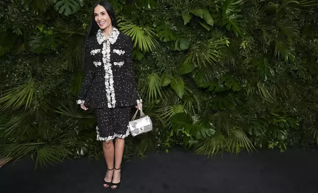 Demi Moore arrives at Chanel's 16th Annual Pre-Oscar Awards Dinner on Saturday, March 1, 2025, at The Beverly Hills Hotel in Beverly Hills, Calif. (Photo by Jordan Strauss/Invision/AP)