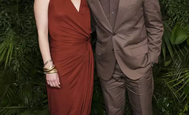 Emma Wall, left, and Jeremy Strong arrive at Chanel's 16th Annual Pre-Oscar Awards Dinner on Saturday, March 1, 2025, at The Beverly Hills Hotel in Beverly Hills, Calif. (Photo by Jordan Strauss/Invision/AP)