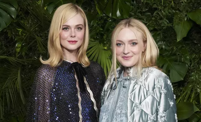Elle Fanning, left, and Dakota Fanning arrive at Chanel's 16th Annual Pre-Oscar Awards Dinner on Saturday, March 1, 2025, at The Beverly Hills Hotel in Beverly Hills, Calif. (Photo by Jordan Strauss/Invision/AP)