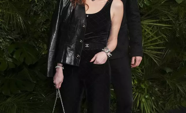 Natasha Lyonne, left, and Bryn Mooser arrive at Chanel's 16th Annual Pre-Oscar Awards Dinner on Saturday, March 1, 2025, at The Beverly Hills Hotel in Beverly Hills, Calif. (Photo by Jordan Strauss/Invision/AP)