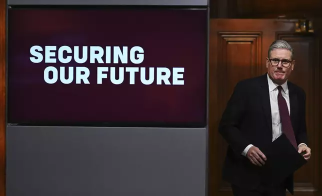 Britain's Prime Minister Keir Starmer arrives for a press conference following this morning's virtual summit video conference at 10 Downing Street in London, England, March 15, 2025. (Leon Neal/Pool Photo via AP)