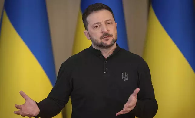 Ukrainian President Volodymyr Zelenskyy speaks during the briefing in Kyiv, Ukraine, Wednesday, March 12, 2025. (AP Photo/Efrem Lukatsky)