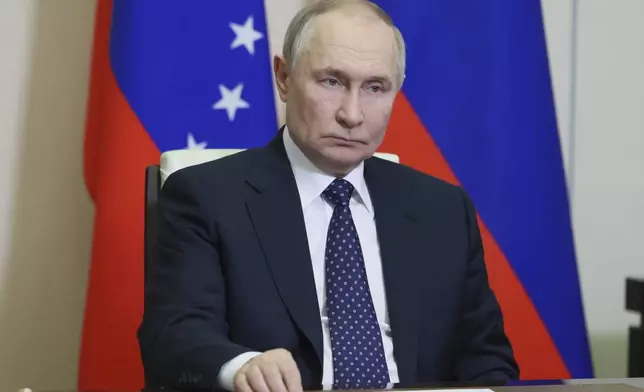 Russian President Vladimir Putin listens to Venezuela's President Nicolás Maduro during their talks via videoconference at the Novo-Ogaryovo state residence outside Moscow, Russia, Friday, March 14, 2025. (Mikhail Metzel, Sputnik, Kremlin Pool Photo via AP)
