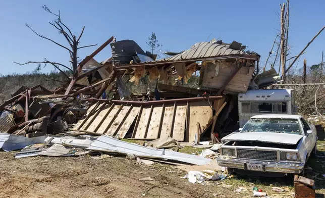 Well known community member Dunk Pickering perished at this warehouse site where he often hosted community members on Dallas County 63, Monday, March 17, 2025, in Plantersville, Ala, following deadly tornados that hit the area Saturday. (AP Photo/Vasha Hunt)