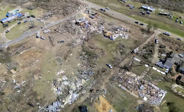This image taken with a drone shows storm damage at the Lovelady Lane and Dallas County 63 interchange, Monday, March 17, 2025, in Plantersville, Ala, following deadly tornados that hit the area Saturday. (AP Photo/Vasha Hunt)