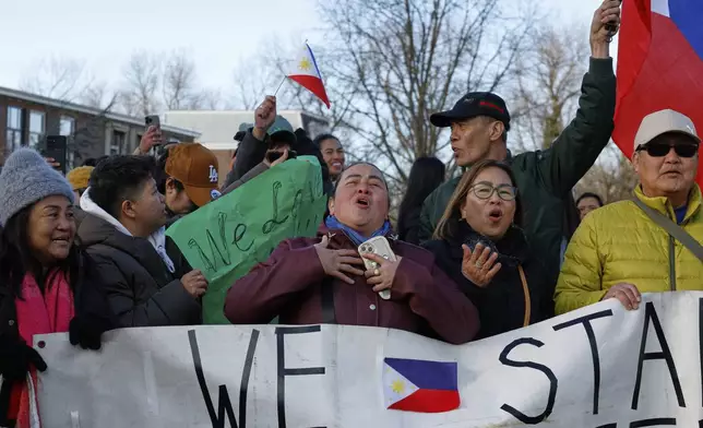 Supporters of former Philippine President Rodrigo Duterte demonstrate outside the International Criminal Court detention center near The Hague in Scheveningen, Netherlands, Wednesday, March 12, 2025. (AP Photo/Omar Havana)
