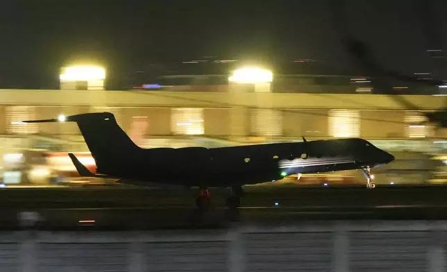 A plane carrying former President Rodrigo Duterte to The Hague takes off in Manila, Philippines on Tuesday, March 11, 2025. (AP Photo/Aaron Favila)