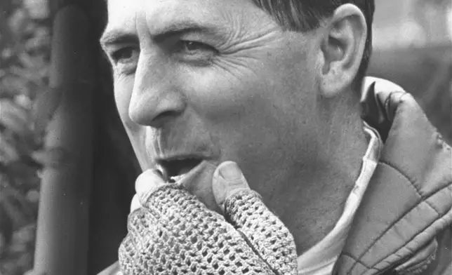 FILE - German Grand Prix Formula One car race winner Jack Brabham of Australia smiles after his victory, making him new World Champion of1 966. (AP Photo/Kurt Strumpf, File)