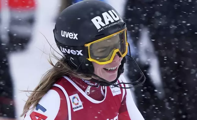 Austria's Katharina Liensberger reacts after completing an alpine ski, women's World Cup slalom in Are, Sweden, Sunday, March 9, 2025. (AP Photo/Giovanni Auletta)