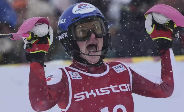 Austria's Katharina Truppe reacts after completing an alpine ski, women's World Cup slalom in Are, Sweden, Sunday, March 9, 2025. (AP Photo/Giovanni Auletta)