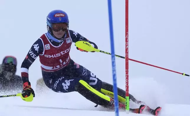 United States' Mikaela Shiffrin speeds down the course during an alpine ski, women's World Cup slalom in Are, Sweden, Sunday, March 9, 2025. (AP Photo/Giovanni Auletta)