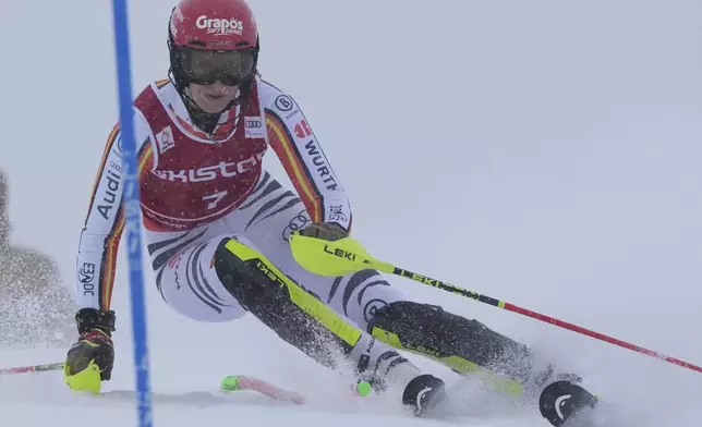 Germany's Lena Duerr speeds down the course during an alpine ski, women's World Cup slalom in Are, Sweden, Sunday, March 9, 2025. (AP Photo/Giovanni Auletta)
