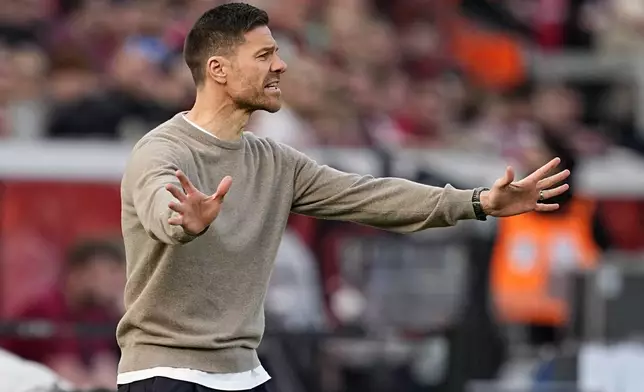 Leverkusen's head coach Xabi Alonso reacts during the Bundesliga soccer match between Bayer Leverkusen and Werder Bremen at the BayArena in Leverkusen, Germany, Saturday, March 8, 2025. (AP Photo/Martin Meissner)