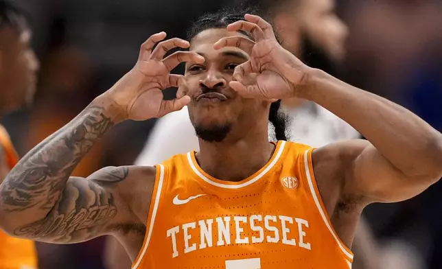 Tennessee guard Zakai Zeigler (5) celebrates after a basket against Auburn during the second half of an NCAA college basketball game in the semifinal round of the Southeastern Conference tournament, Saturday, March 15, 2025, in Nashville, Tenn. (AP Photo/George Walker IV)