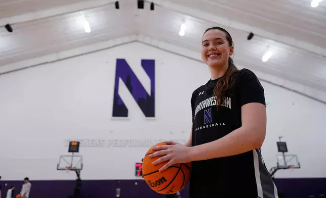 Northwestern freshman Kat Righeimer, one of six women from Kobe Bryant’s Mamba Academy going through their first experience with college basketball, poses for photo during NCAA college basketball practice in Evanston, Ill., Tuesday, Feb. 25, 2025. (AP Photo/Nam Y. Huh)