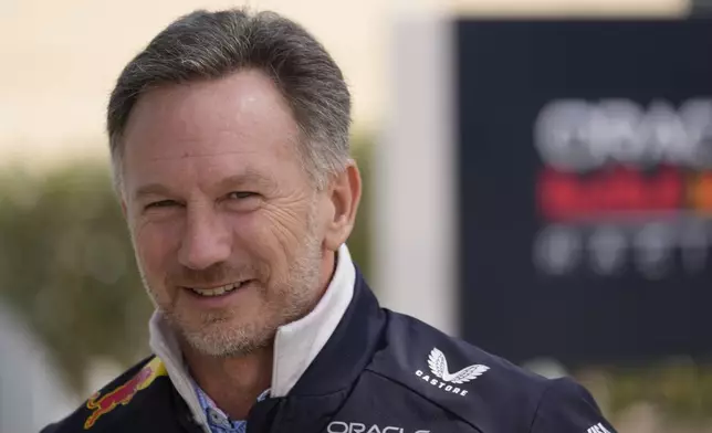 Red Bull team principal Christian Horner walks to the track during a Formula One pre-season test at the Bahrain International Circuit in Sakhir, Bahrain, Friday, Feb. 28, 2025. (AP Photo/Darko Bandic)
