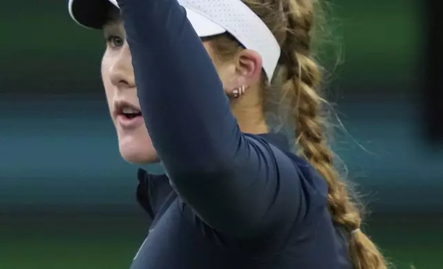 Mirra Andreeva, of Russia, celebrates winning a point against Iga Swiatek, of Poland, during the semifinals at the BNP Paribas Open tennis tournament Friday, March 14, 2025, in Indian Wells, Calif. (AP Photo/Mark J. Terrill)
